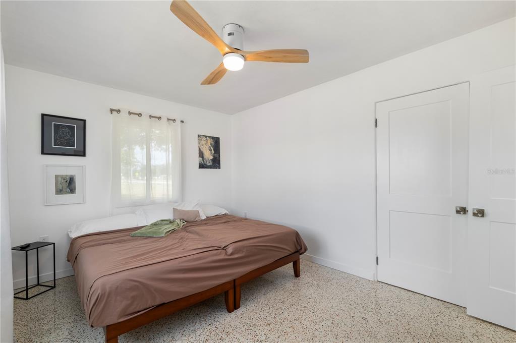624 West Virginia Avenue Punta Gorda, FL 33950 - Photo 26 of 45 a bedroom with a bed and a window