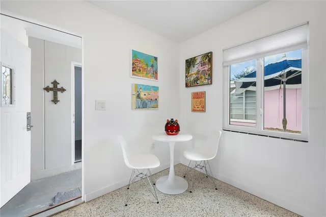 a kitchen that has a sink cabinets and stainless steel appliances