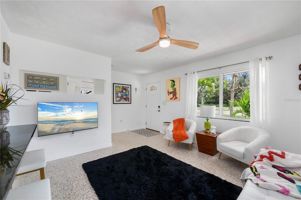 624 West Virginia Avenue Punta Gorda, FL 33950 - Photo 38 of 45 a bedroom with furniture and a window