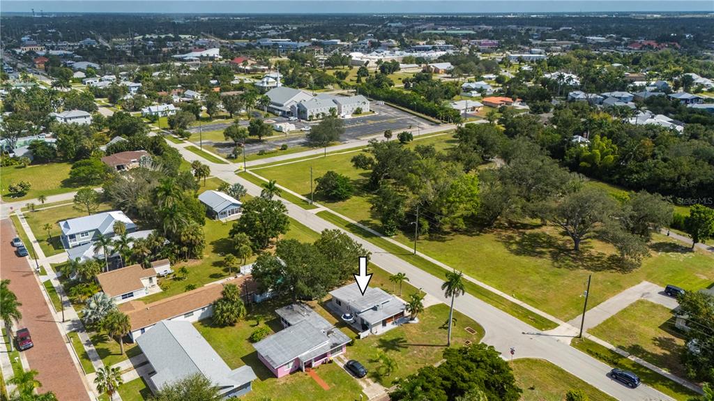 624 West Virginia Avenue Punta Gorda, FL 33950 - Photo 8 of 45 an aerial view of residential houses with outdoor space