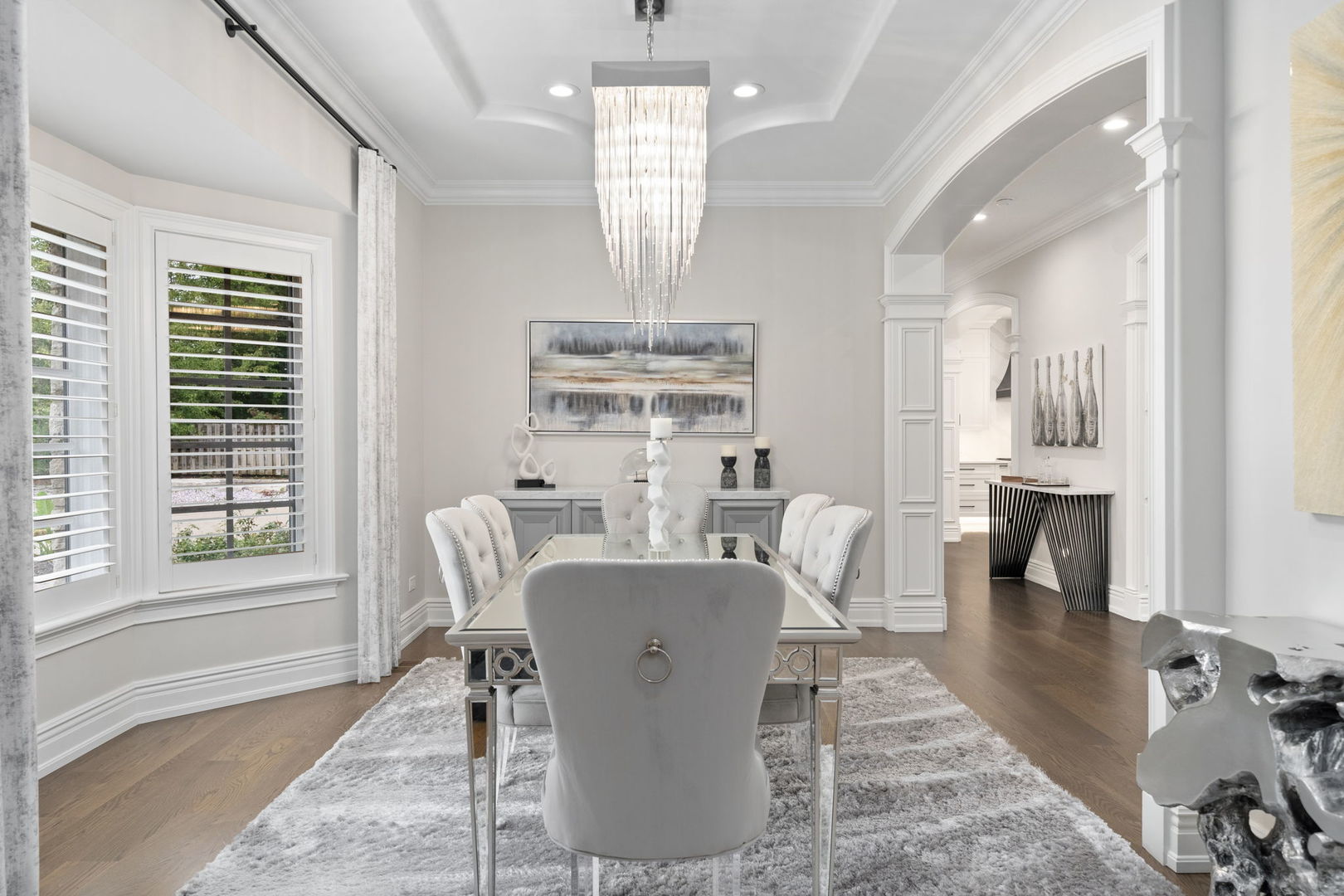 6403 South Garfield Street Burr Ridge, IL 60527 - Photo 13 of 95 a dining room with wooden floor and a chandelier