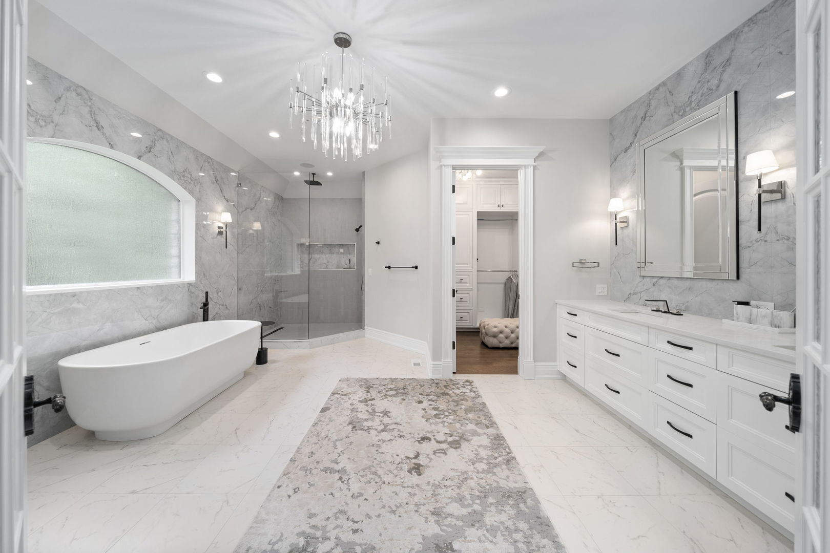6403 South Garfield Street Burr Ridge, IL 60527 - Photo 26 of 95 a spacious bathroom with a double vanity sink a large mirror a bathtub and a shower