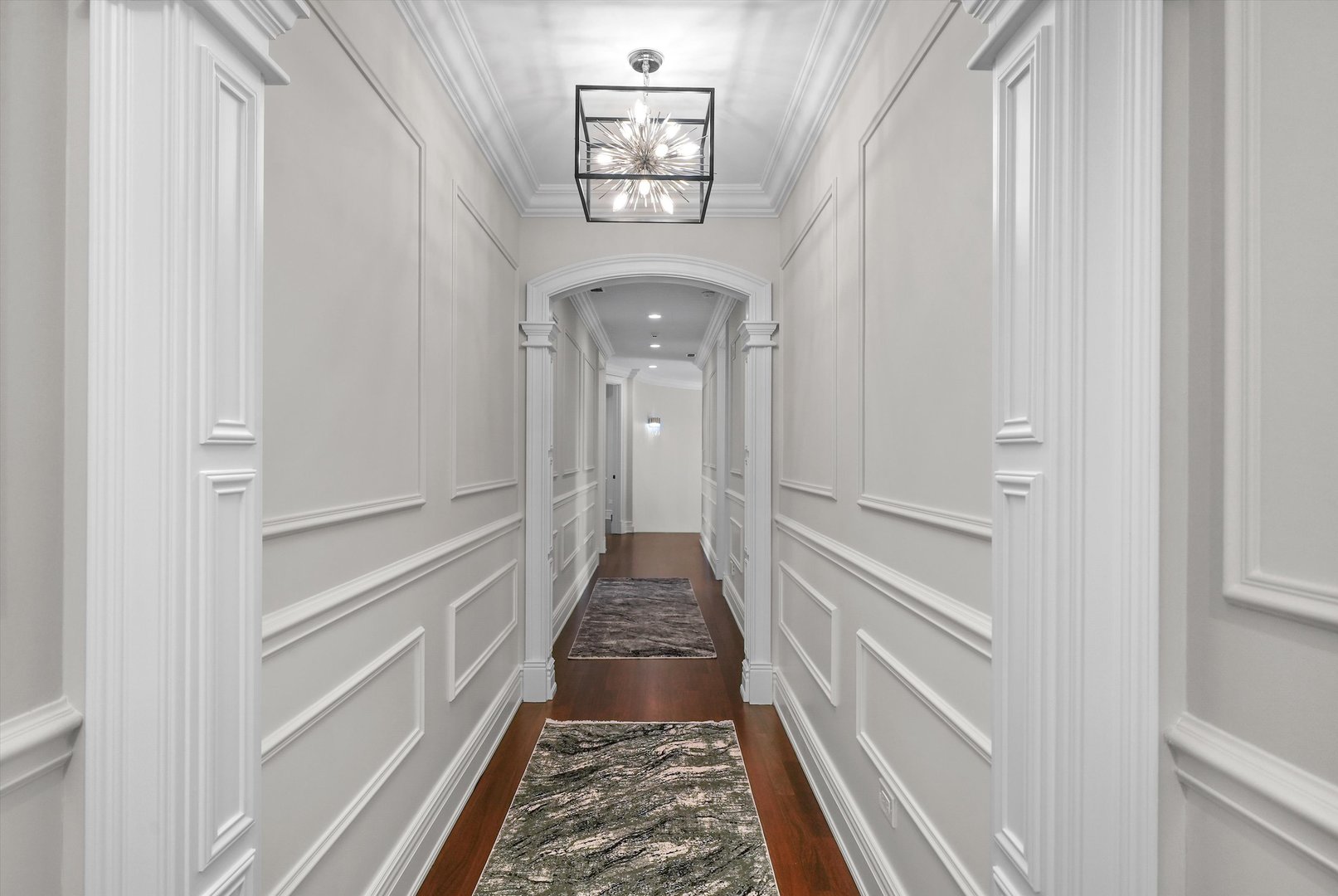 6403 South Garfield Street Burr Ridge, IL 60527 - Photo 41 of 95 a view of a hallway with wooden floor and a door