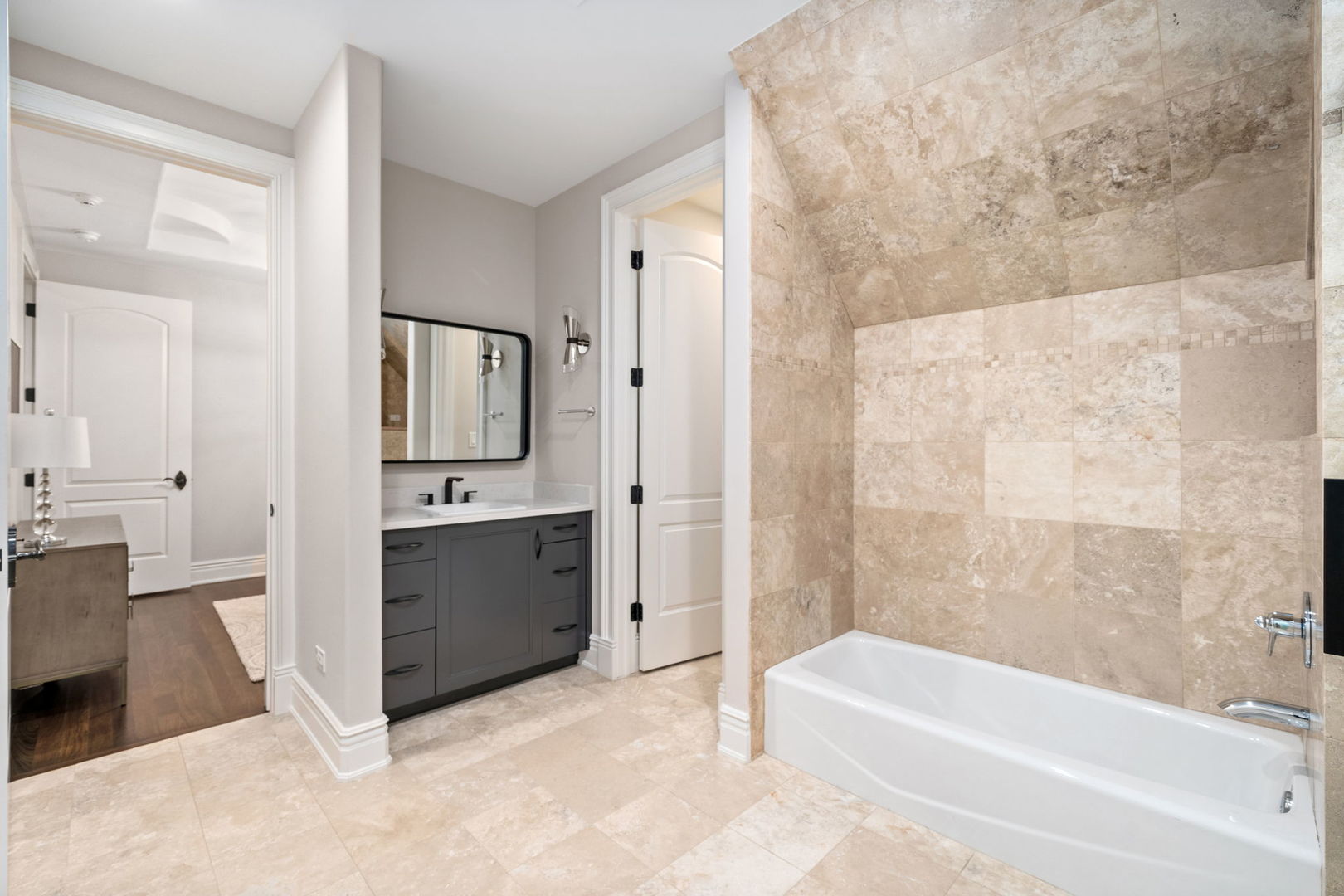 6403 South Garfield Street Burr Ridge, IL 60527 - Photo 53 of 95 a spacious bathroom with a tub sink and mirror