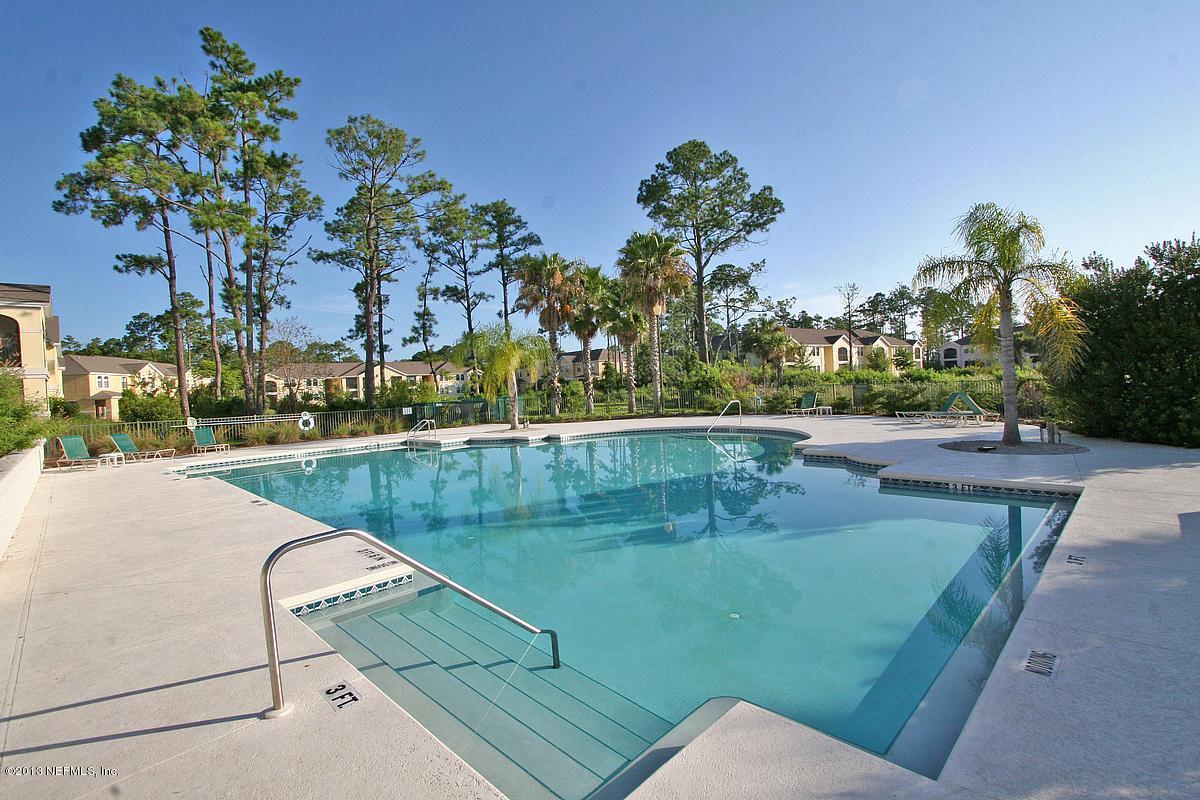 3117 Haley Pointe Road, Unit 3117 St. Augustine, FL 32084 - Photo 17 of 23 a view of a swimming pool with a patio