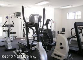 3117 Haley Pointe Road, Unit 3117 St. Augustine, FL 32084 - Photo 23 of 23 a view of a room with gym equipment