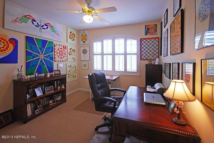 3117 Haley Pointe Road, Unit 3117 St. Augustine, FL 32084 - Photo 9 of 23 a view of a workspace with furniture and a window
