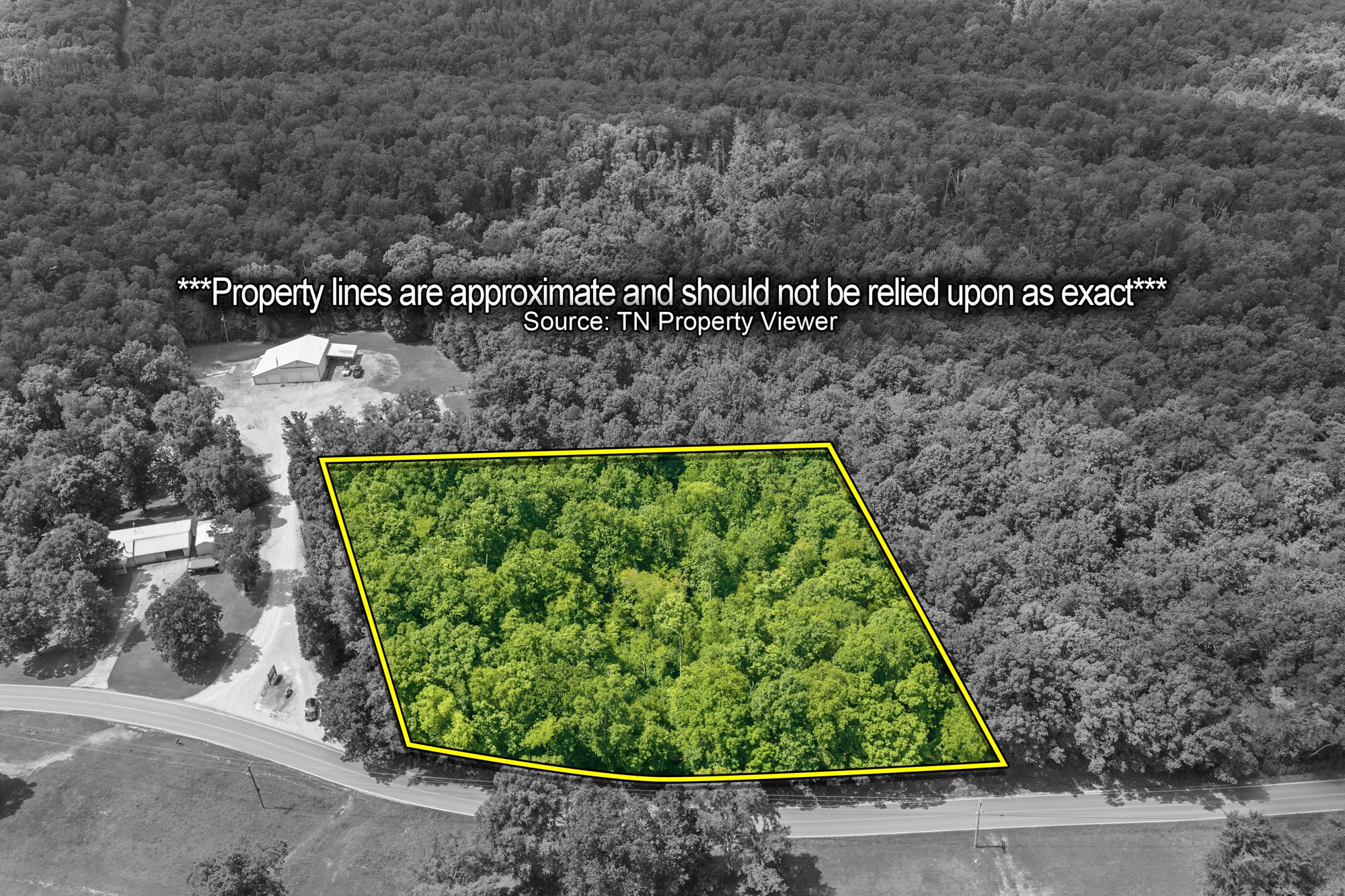 1 Cherokee Heights Road Sugar Tree, TN 38380 - Photo 1 of 13 a view of a back yard