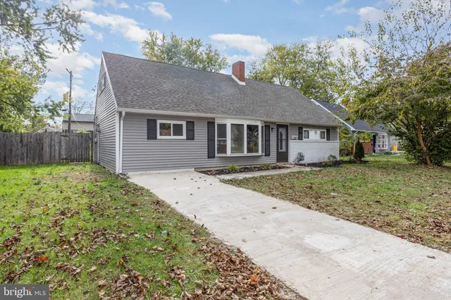 front view of house with a yard