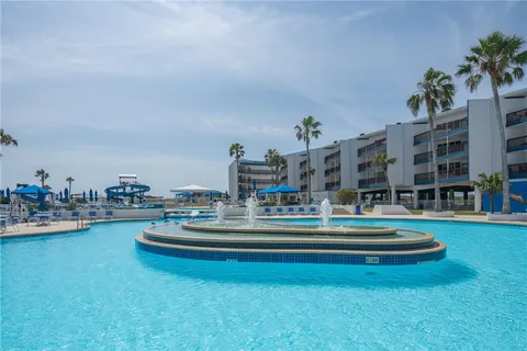 a view of a swimming pool and outdoor space