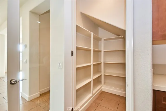 a bathroom with a double vanity sink a and mirror