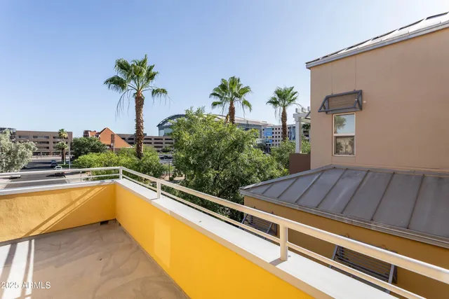 a view of a swimming pool with a lounge chair