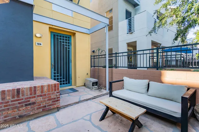 a building outdoor space with patio furniture