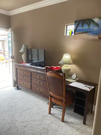 a workspace with furniture and window