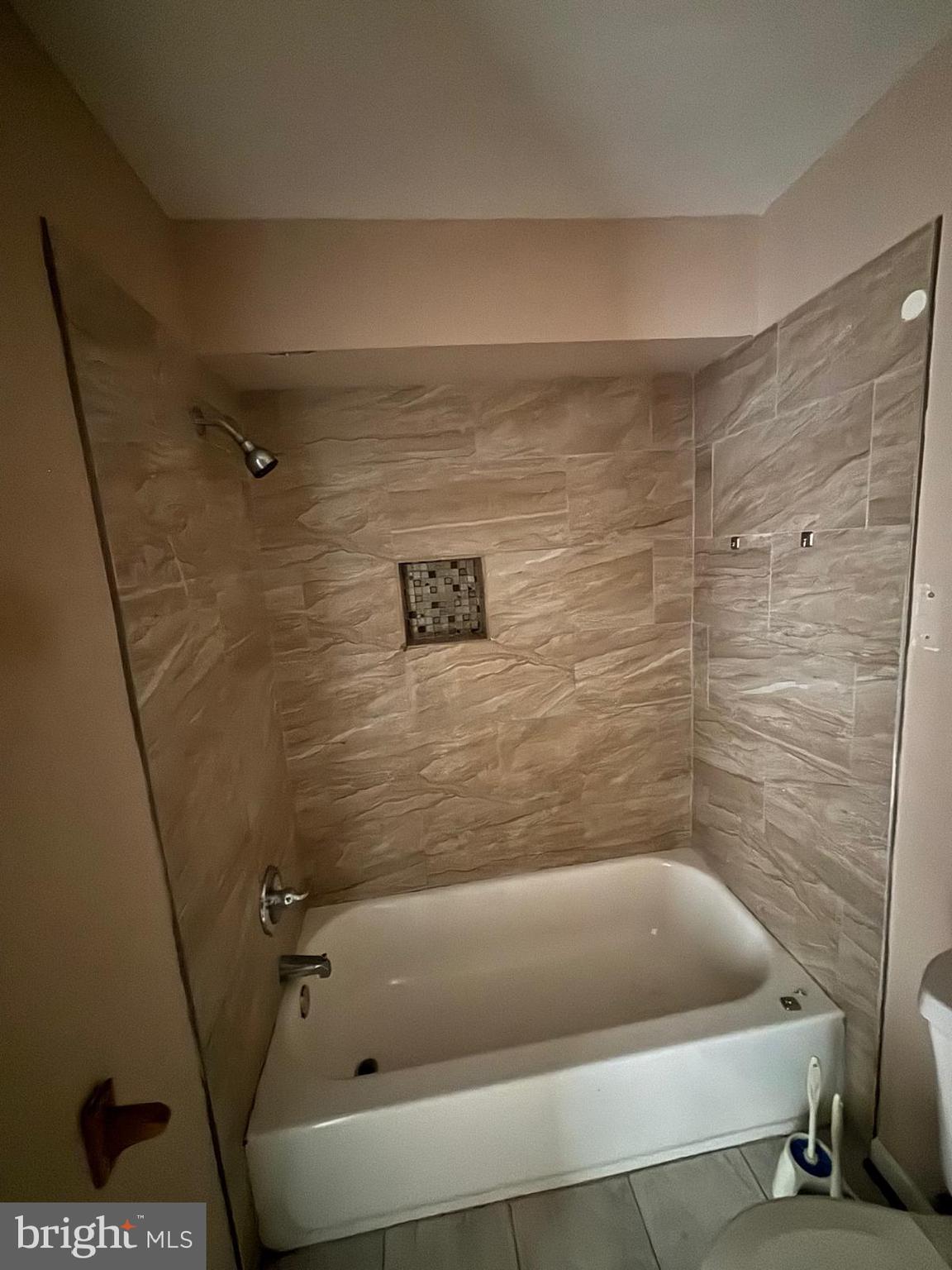 2328 East Madison Street Baltimore, MD 21205 - Photo 10 of 10 a bathroom with a bathtub