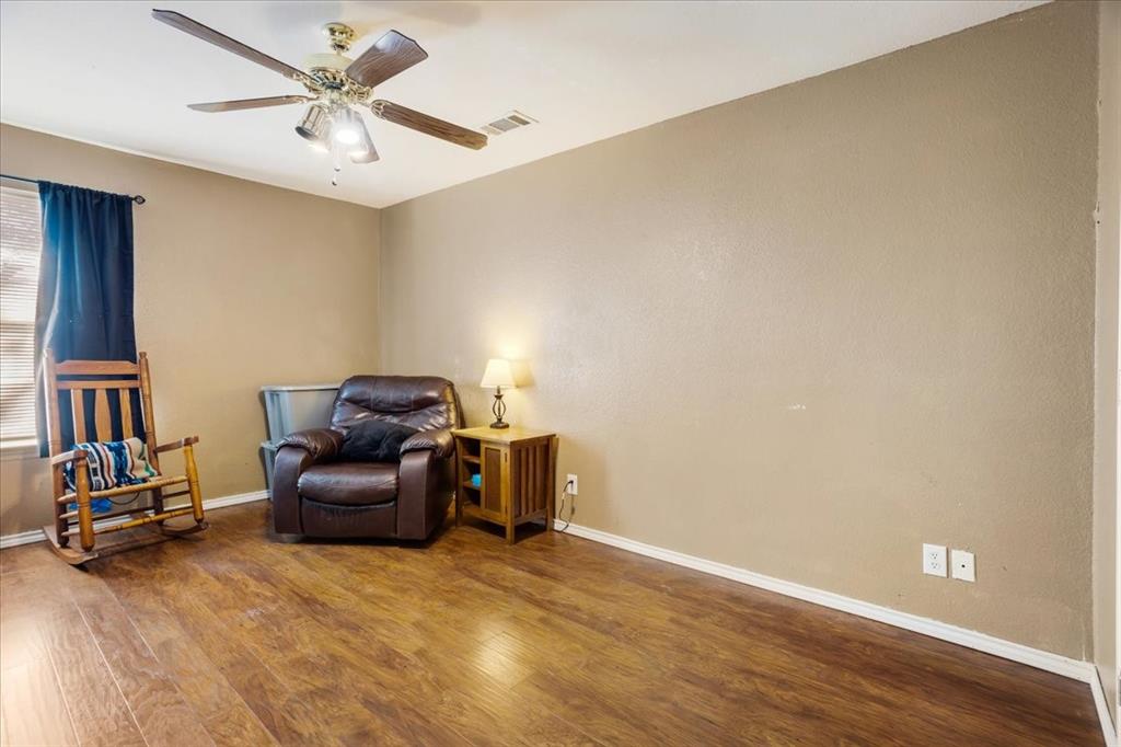 227 North Hopson Street Van Alstyne, TX 75495 - Photo 18 of 38 a view of workspace with wooden floor
