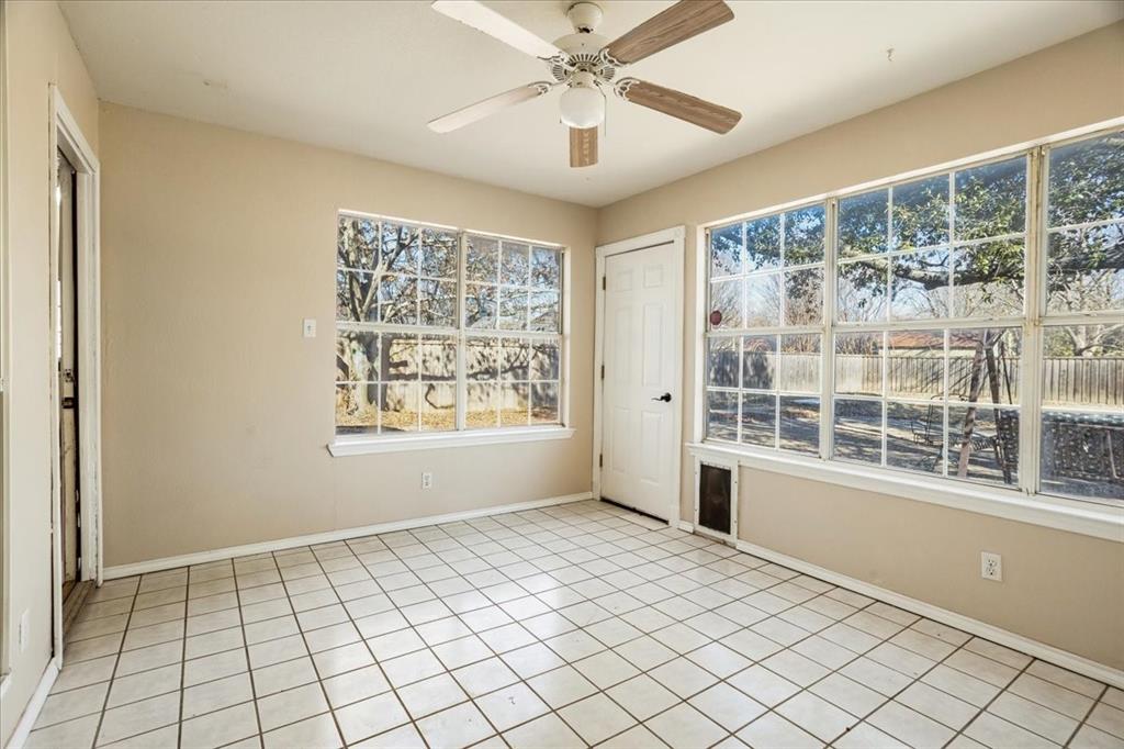 227 North Hopson Street Van Alstyne, TX 75495 - Photo 23 of 38 a view of an empty room with a window