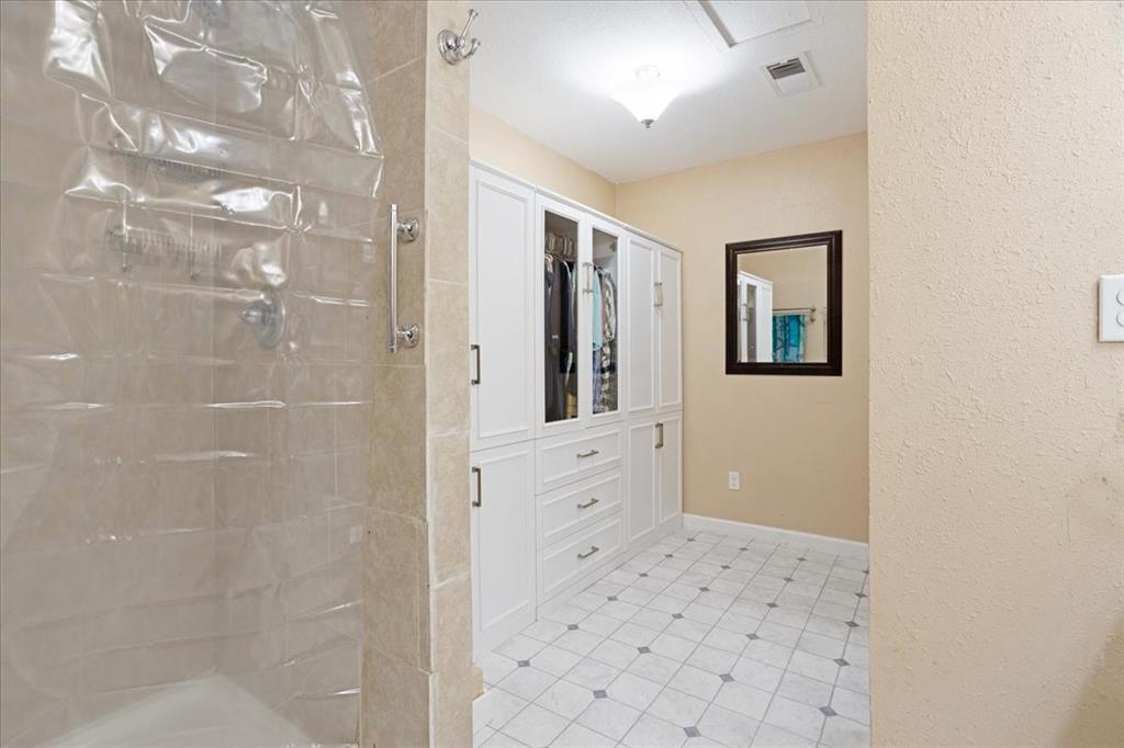 227 North Hopson Street Van Alstyne, TX 75495 - Photo 30 of 38 a bathroom with a shower and a sink