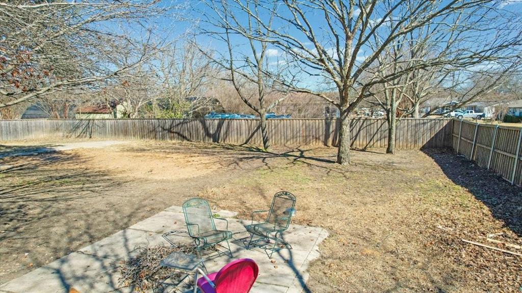 227 North Hopson Street Van Alstyne, TX 75495 - Photo 34 of 38 a view of swimming pool with a yard