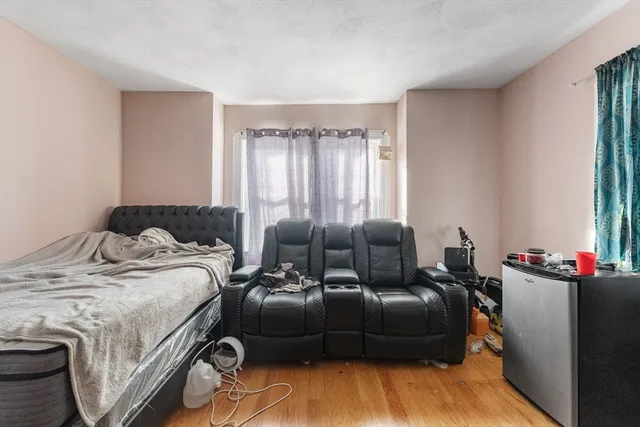 a bed room with a bed and a couch