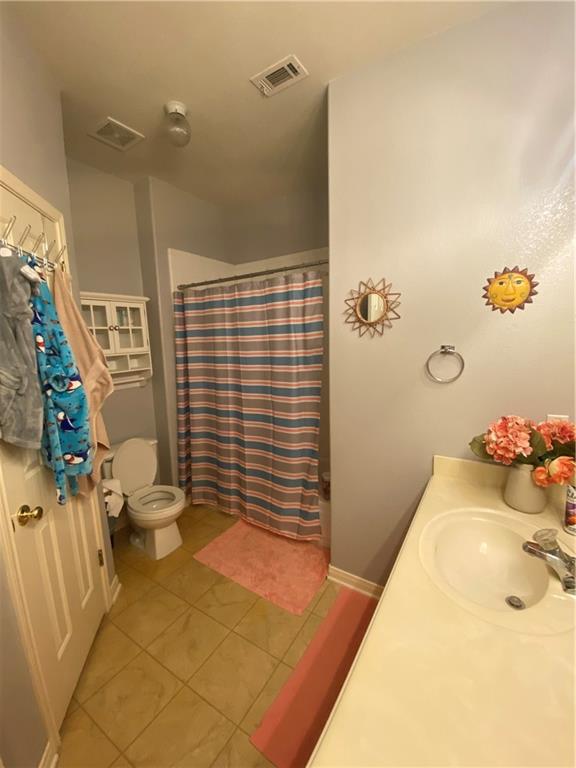 15802 Garrison Circle Austin, TX 78717 - Photo 11 of 17 a bathroom with a sink toilet and shower