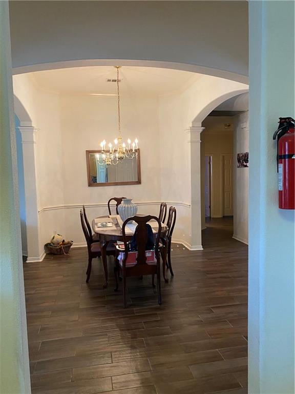15802 Garrison Circle Austin, TX 78717 - Photo 5 of 17 a view of a dining room with furniture and chandelier