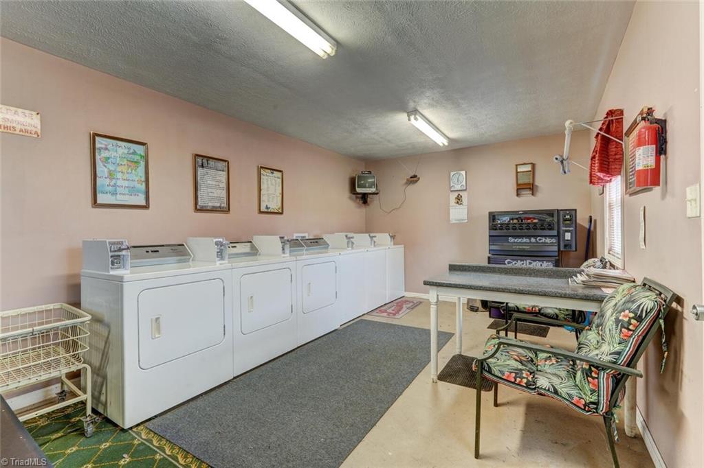 5221 Highway 700 Eden, NC 27288 - Photo 34 of 38 On Site Laundry facility 3 washers & 3 dryers