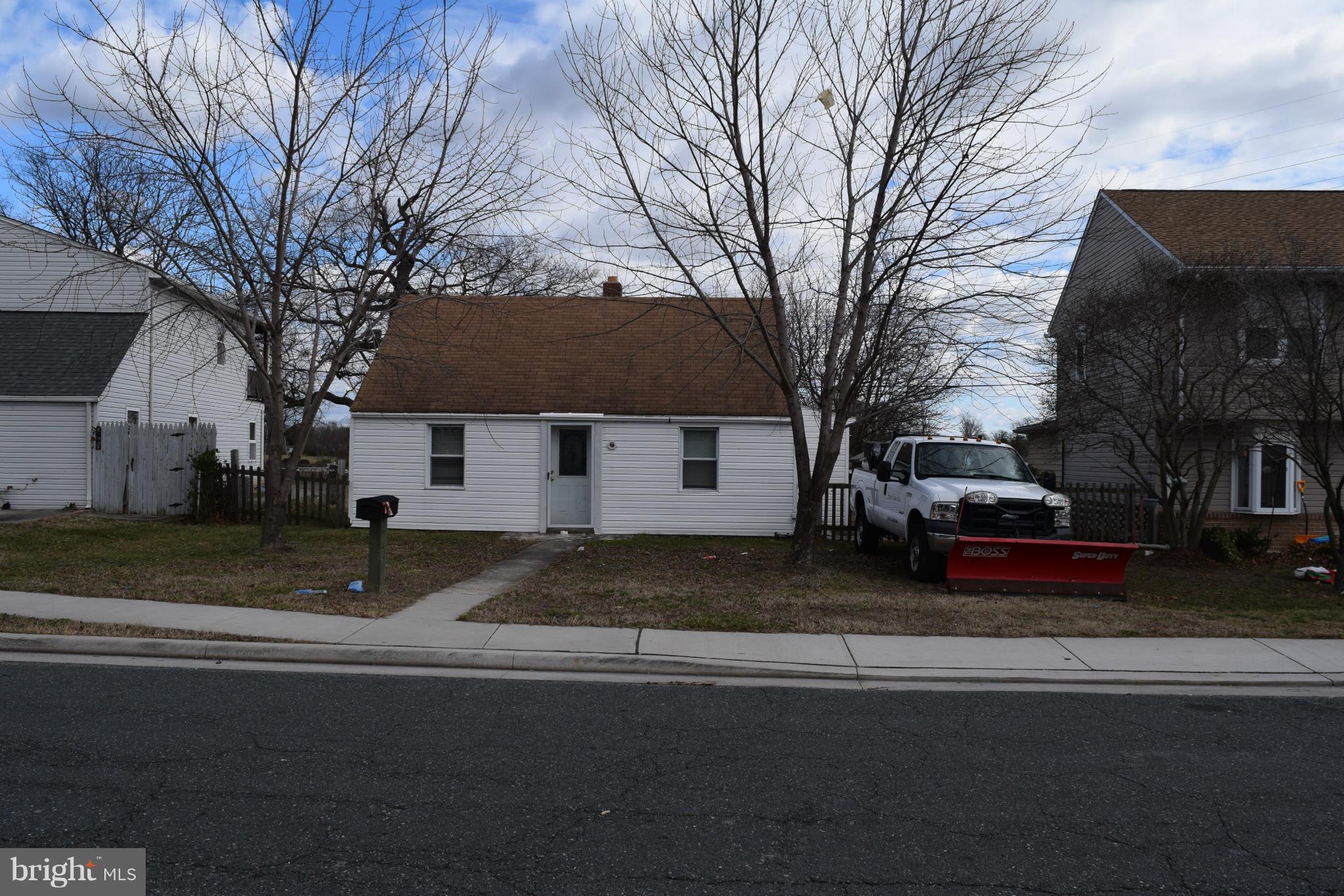 7737 Fairgreen Road Baltimore, MD 21222 - Photo 1 of 28 a view of street with parked cars