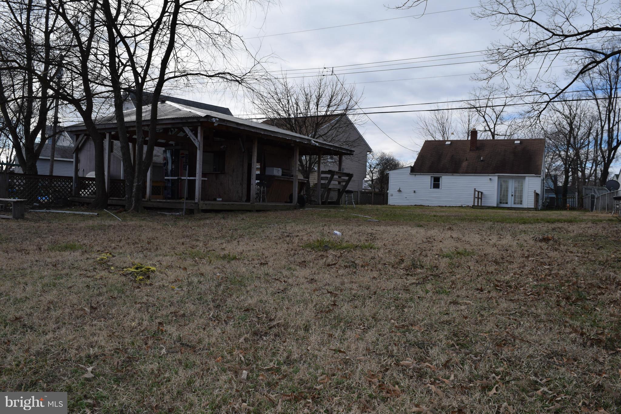 7737 Fairgreen Road Baltimore, MD 21222 - Photo 25 of 28 a view of a house with a back yard