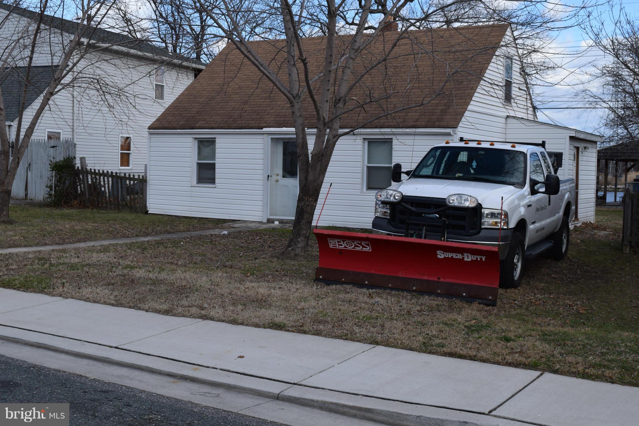 7737 Fairgreen Road Baltimore, MD 21222 - Photo 26 of 28 a car parked in front of a house