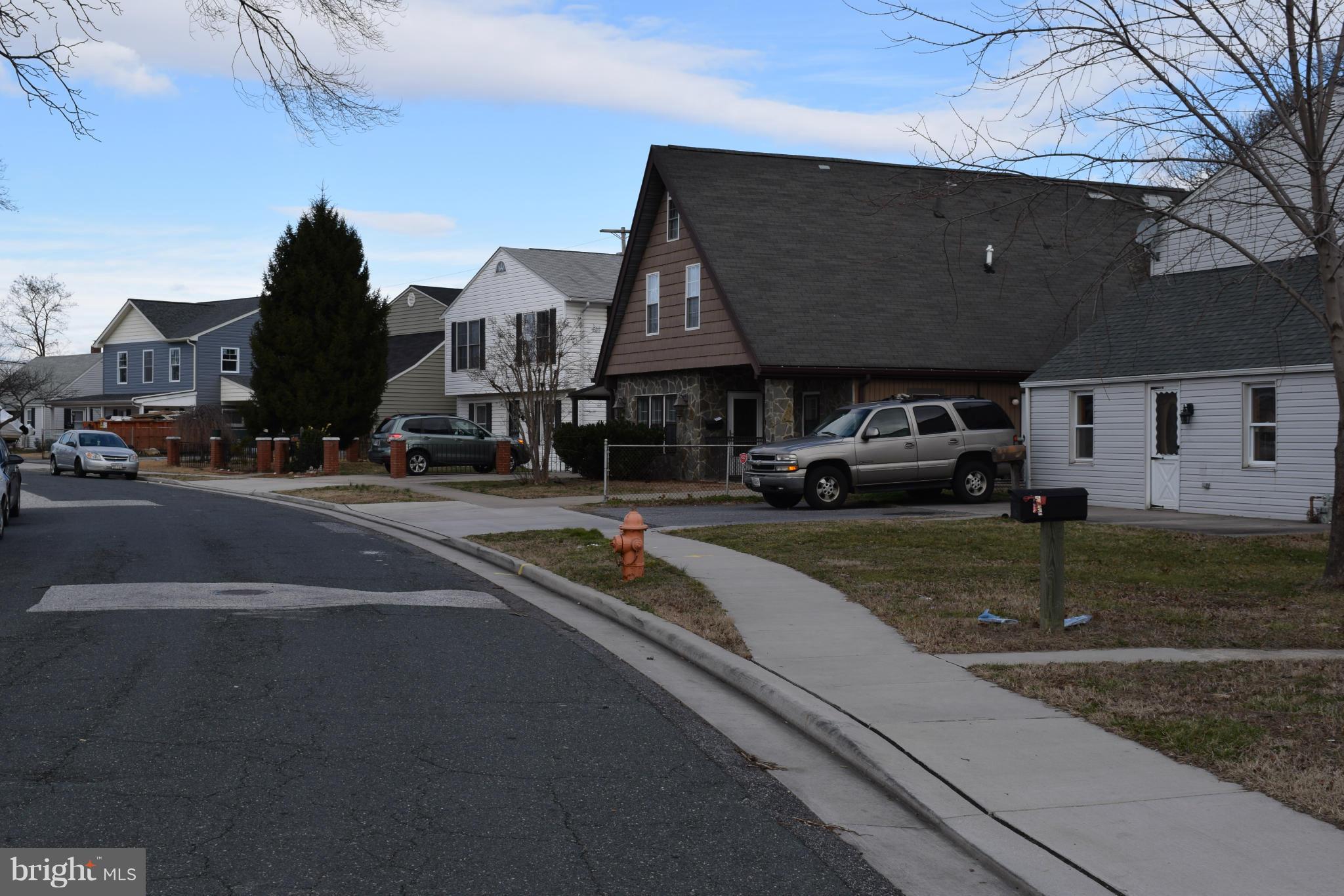 7737 Fairgreen Road Baltimore, MD 21222 - Photo 27 of 28 a view of street with parked cars