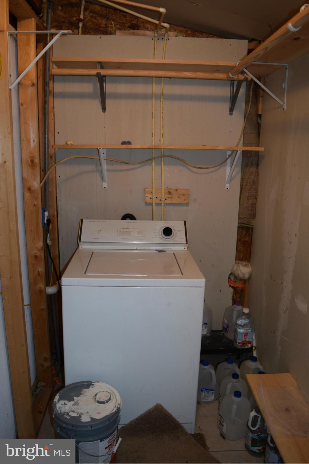 7737 Fairgreen Road Baltimore, MD 21222 - Photo 9 of 28 a utility room with dryer and washer