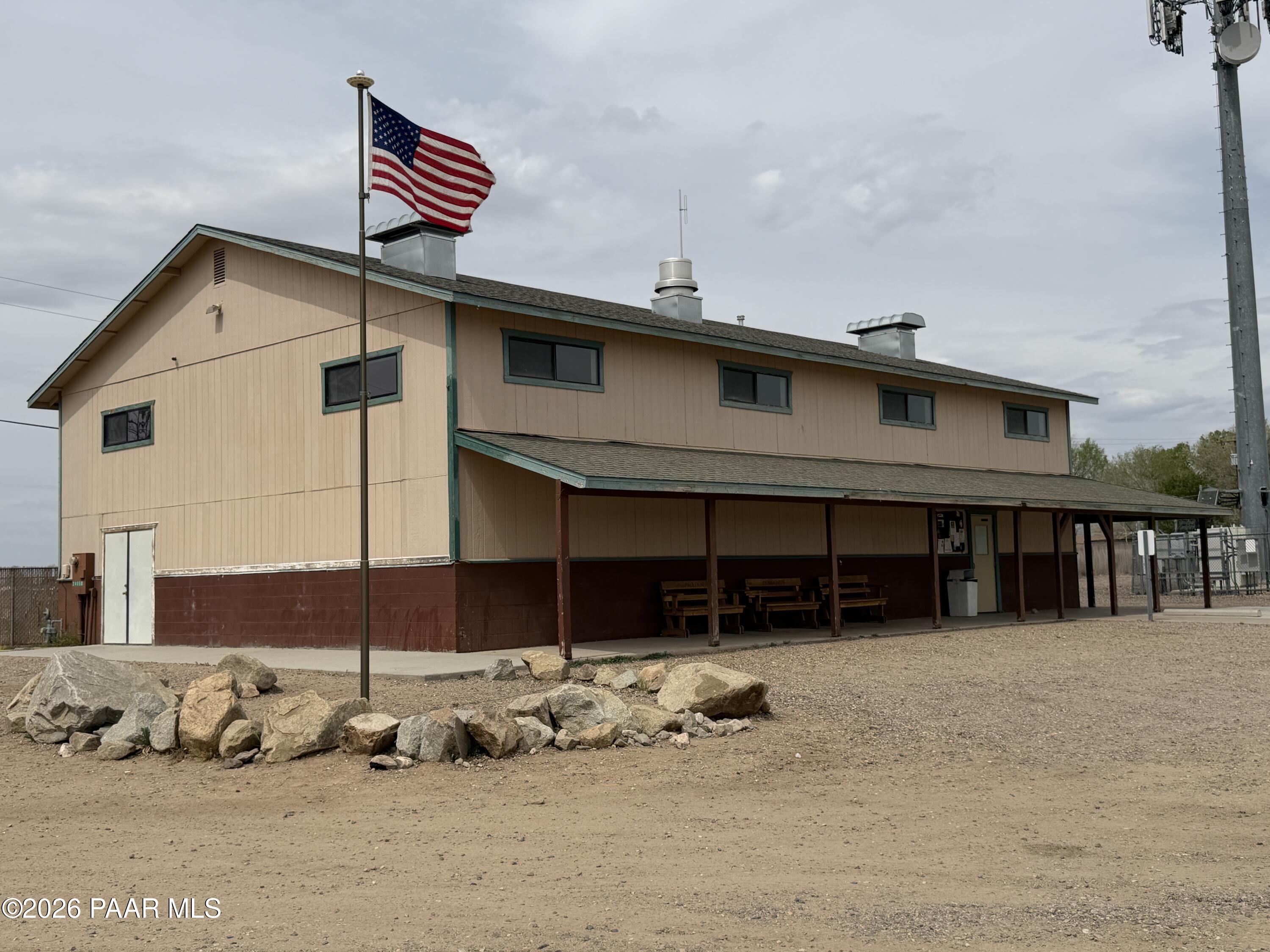 3889 West Onyx Road Paulden, AZ 86334 - Photo 104 of 113 a front view of a house with a yard