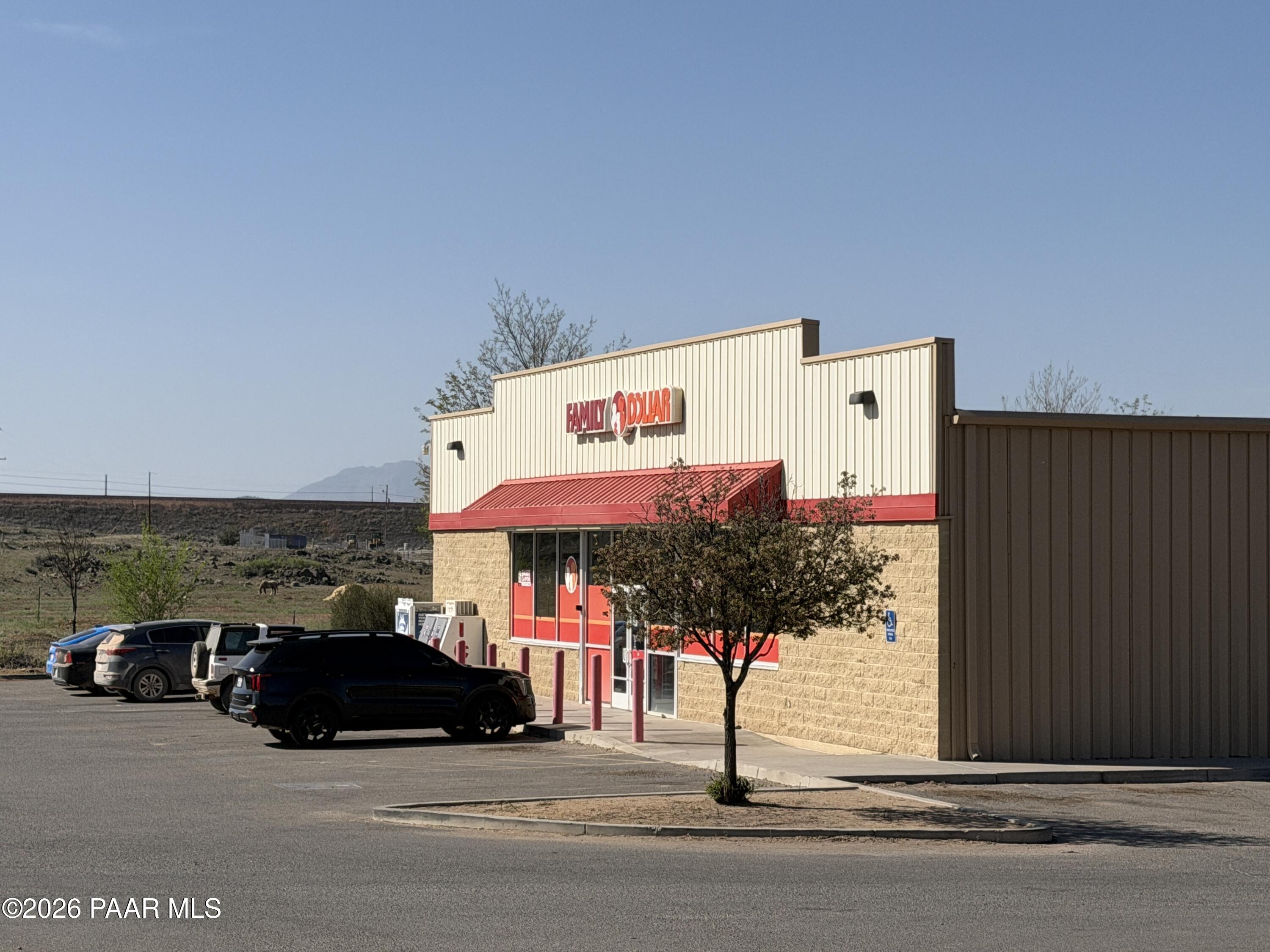 3889 West Onyx Road Paulden, AZ 86334 - Photo 19 of 113 a view of a street with cars parked in front of it
