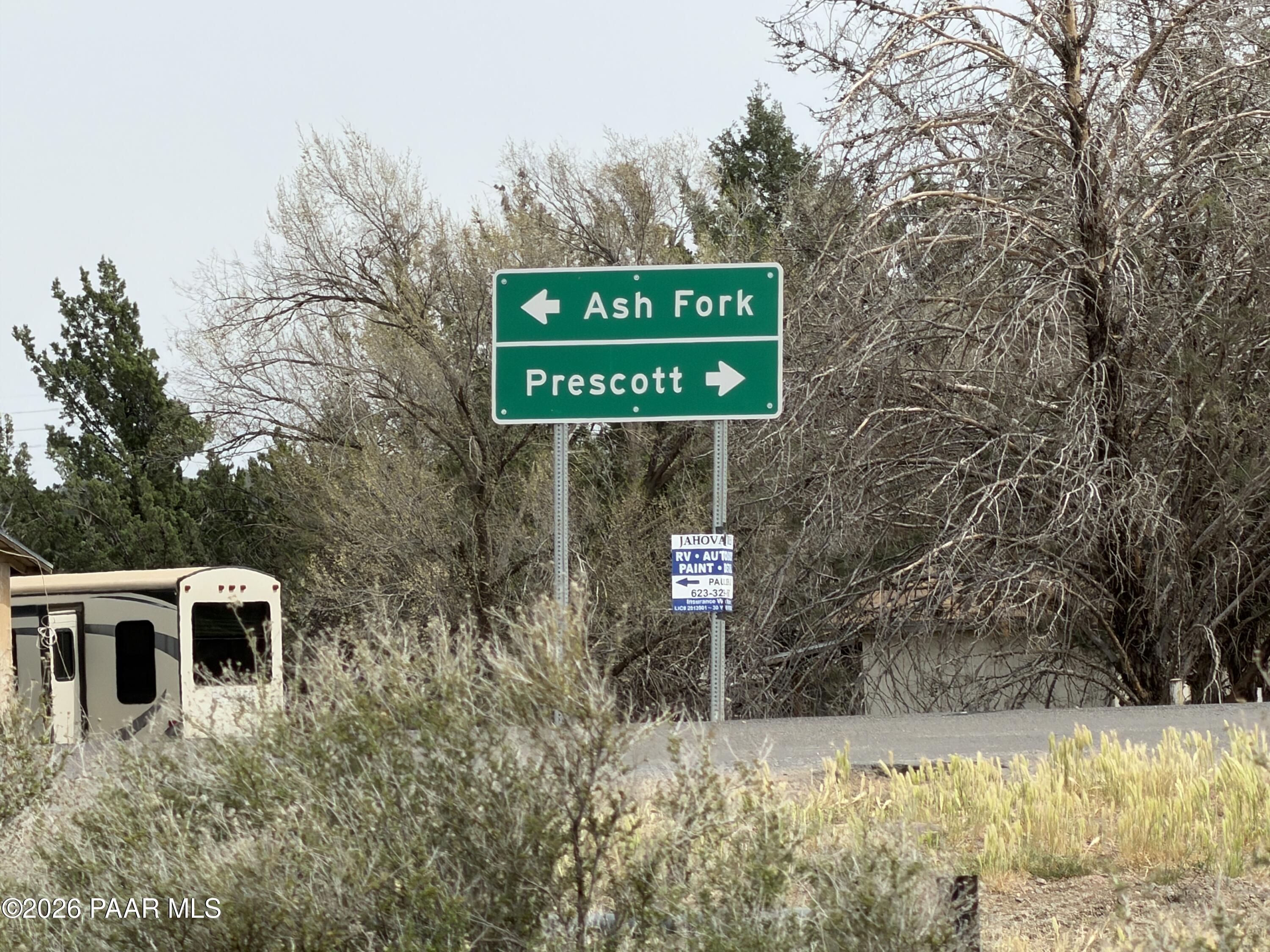 3889 West Onyx Road Paulden, AZ 86334 - Photo 48 of 113 a sign that is on the side of a building