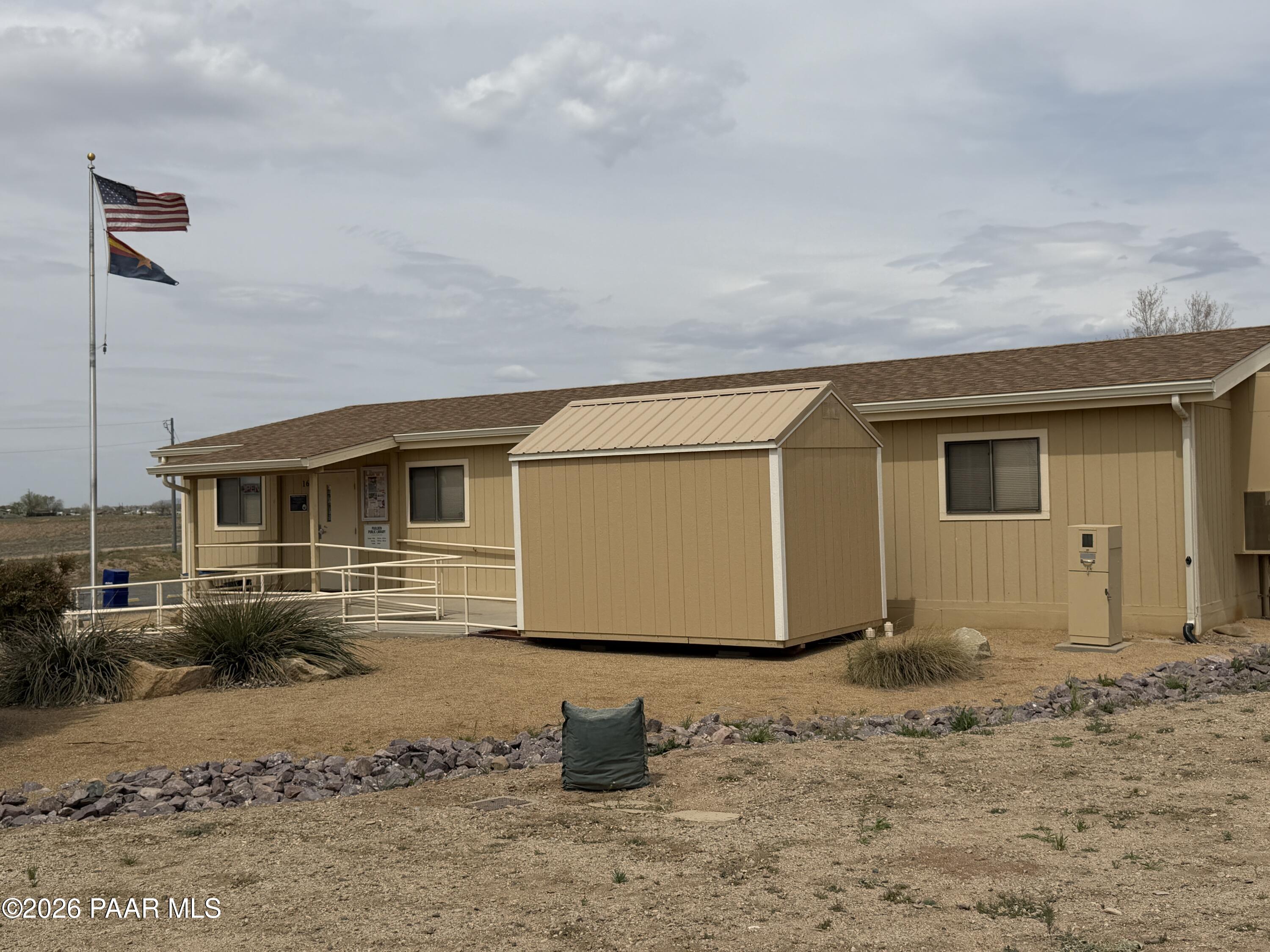 3889 West Onyx Road Paulden, AZ 86334 - Photo 95 of 113 a front view of a house with a yard