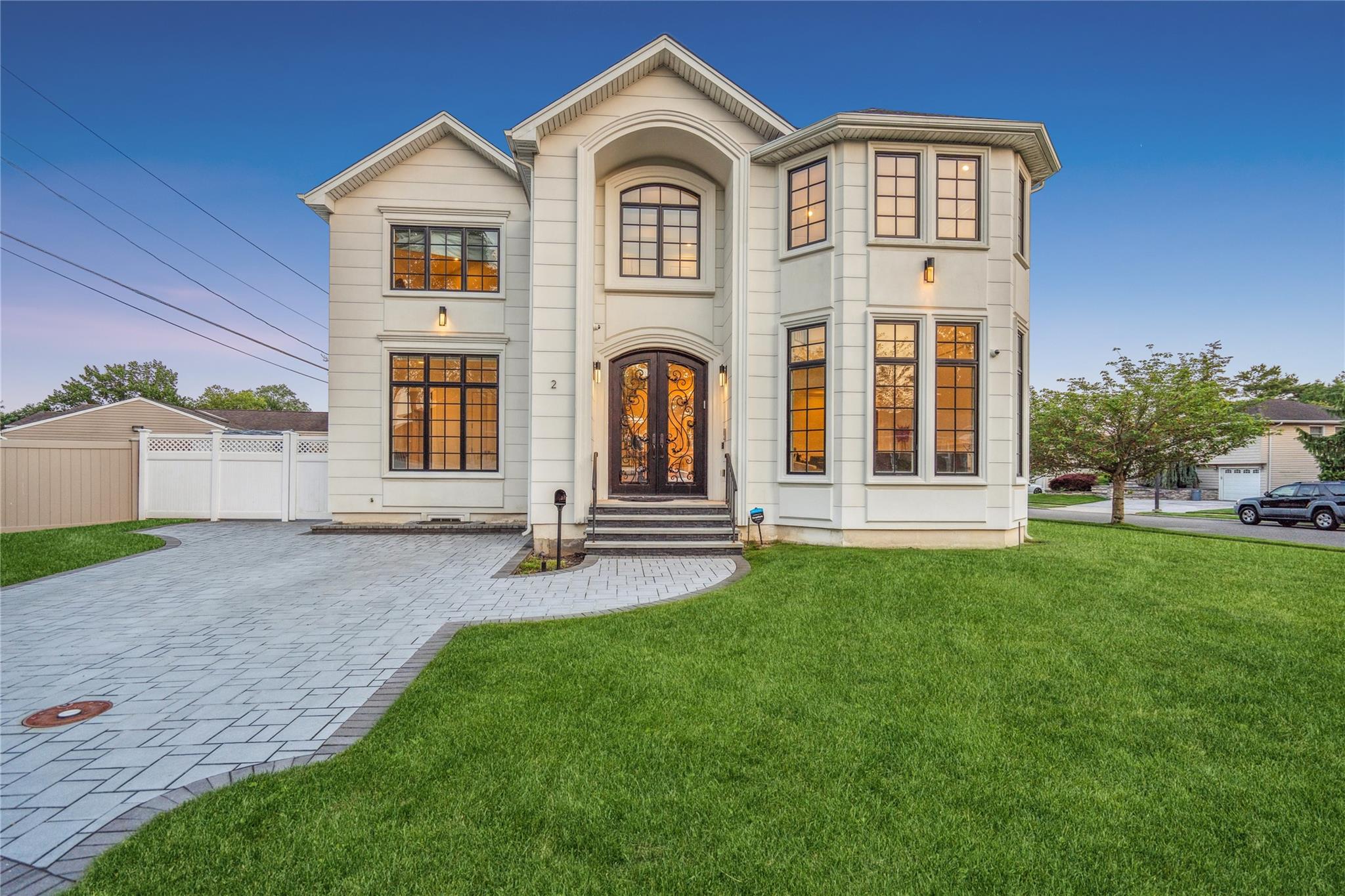 2 Eva Lane Plainview, NY 11803 - Photo 1 of 1 View of front of house with decorative driveway and french doors