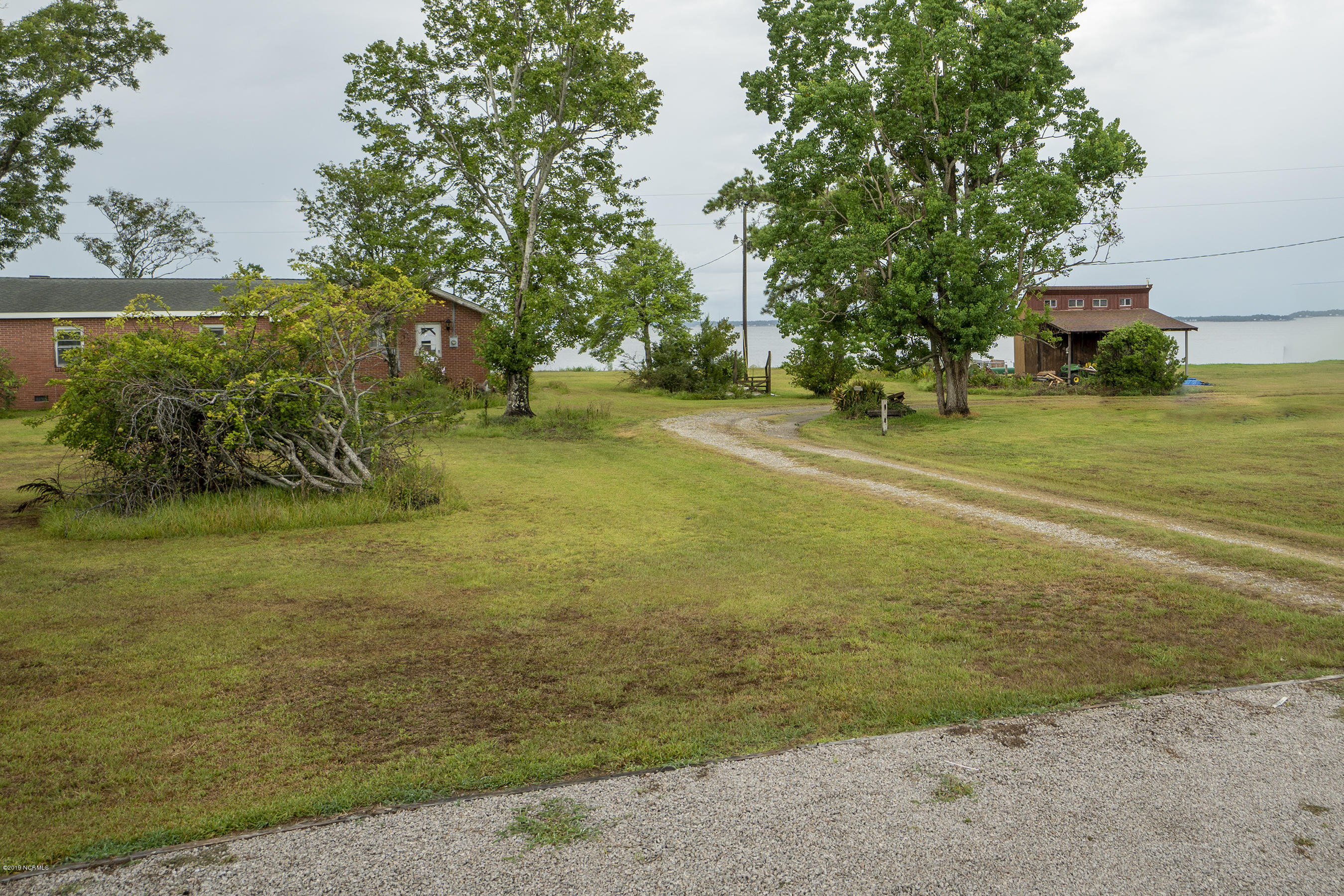 156 Great Neck Road Havelock, NC 28532 - Photo 22 of 23 Driveway Leading To the Home w/ a View