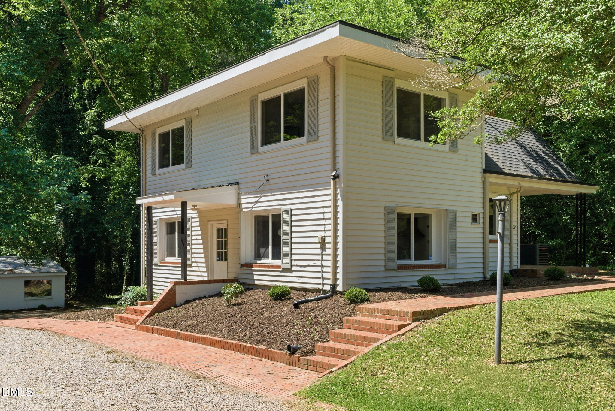 1615 Carbonton Road Sanford, NC 27330 - Photo 3 of 49 a front view of a house with a yard
