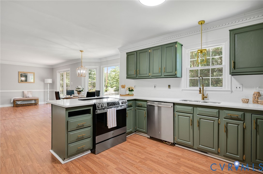 10110 Holly Road Mechanicsville, VA 23116 - Photo 14 of 26 Kitchen featuring sage green cabinetry, stainless