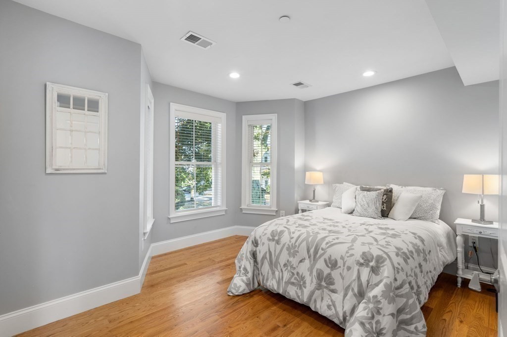 25 Cherry Street, Unit 3 Danvers, MA 01923 - Photo 17 of 27 a bedroom with a bed and a window