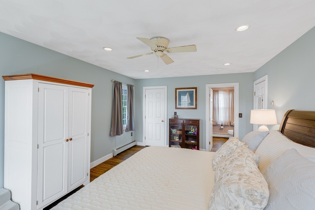 54 Old Merrill Street Amesbury, MA 01913 - Photo 20 of 34 a bedroom with furniture and a bed
