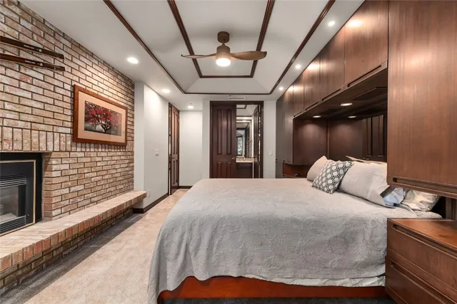 a bed room with a bed and a television