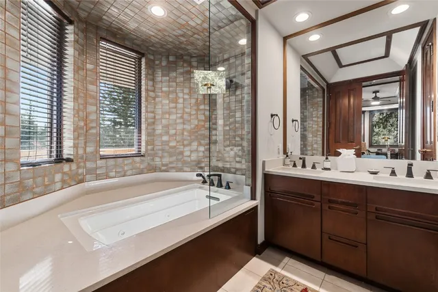 a balcony with table and chairs