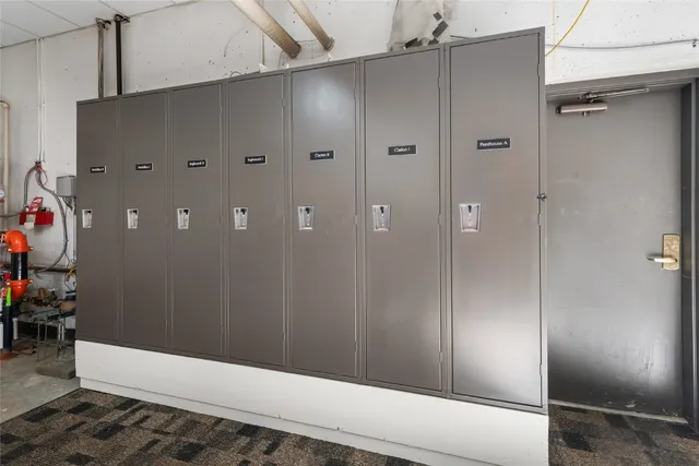 a swimming pool with some trees in the background