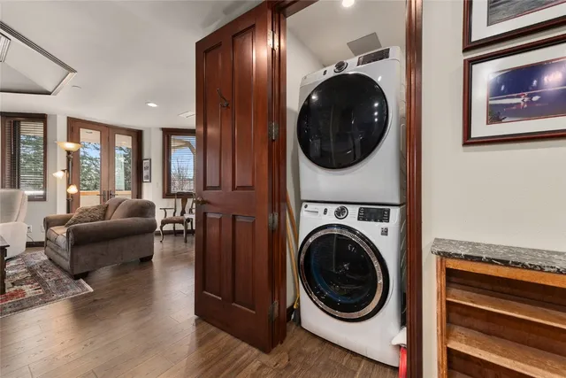 a view of a hallway with washer and dryer