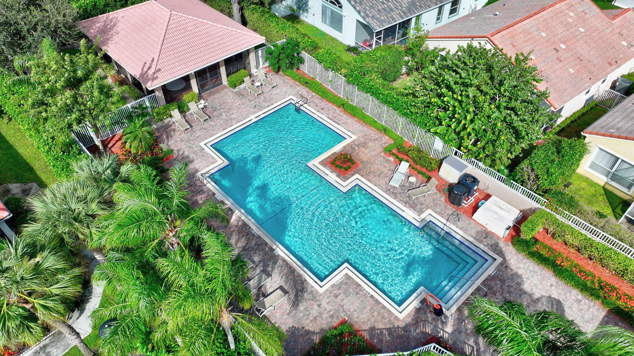 320 Northwest 67th Street, Unit C207 Boca Raton, FL 33487 - Photo 25 of 39 an aerial view of a house with a garden