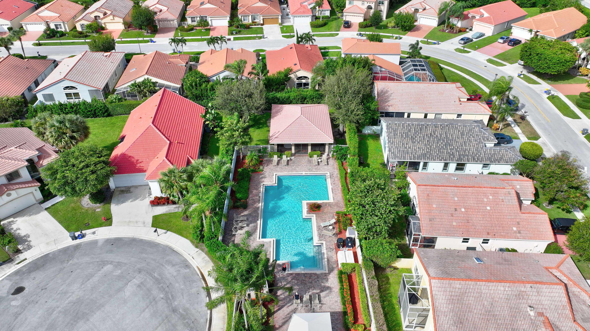 320 Northwest 67th Street, Unit C207 Boca Raton, FL 33487 - Photo 26 of 39 an aerial view of residential houses with outdoor space