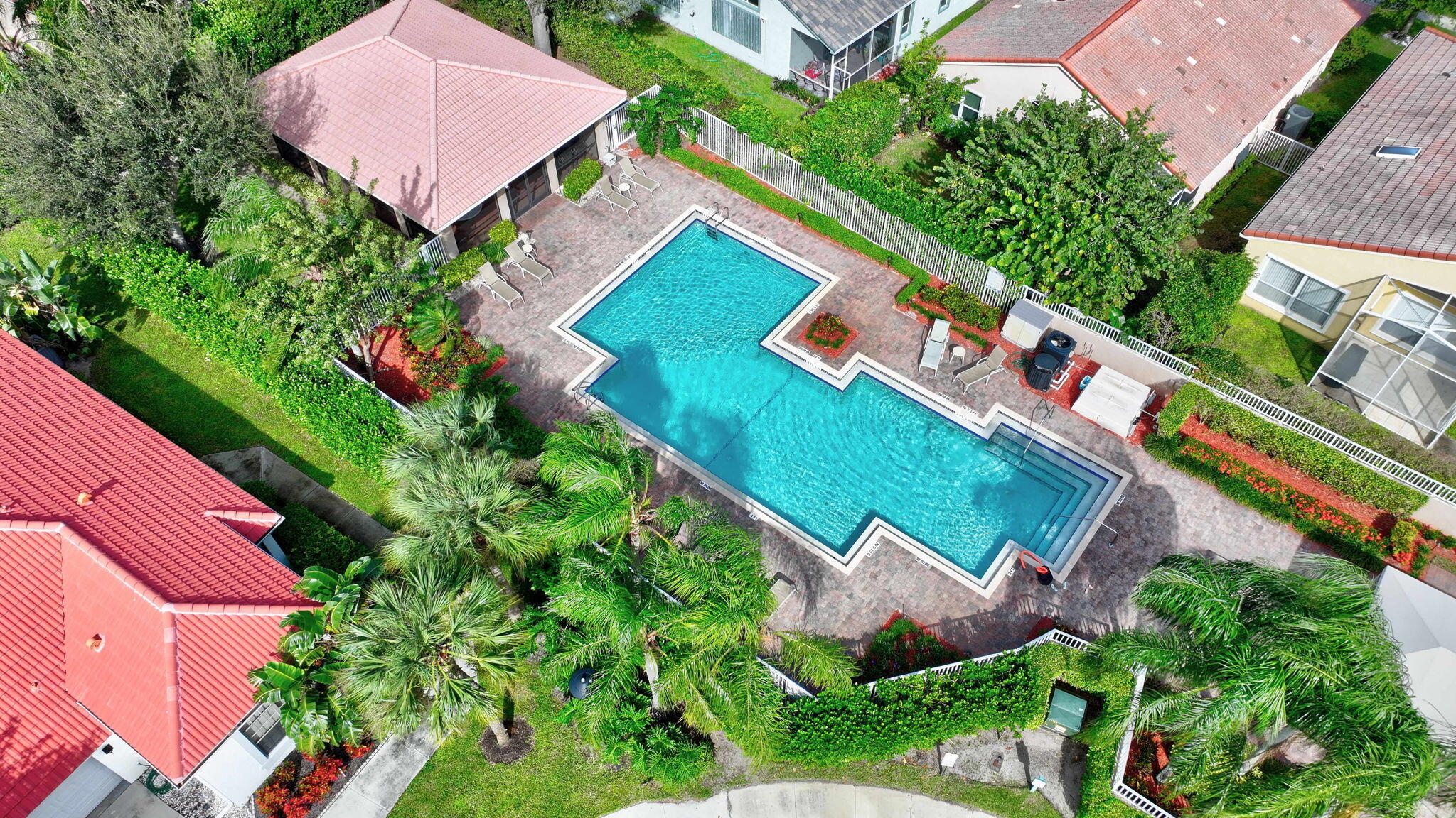 320 Northwest 67th Street, Unit C207 Boca Raton, FL 33487 - Photo 27 of 39 an aerial view of house with a yard and outdoor seating