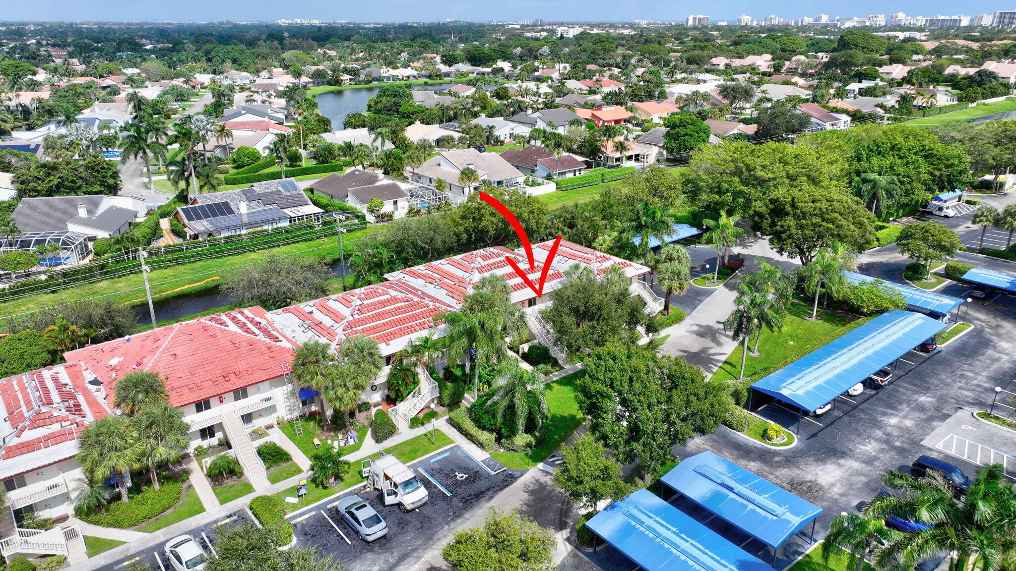 320 Northwest 67th Street, Unit C207 Boca Raton, FL 33487 - Photo 31 of 39 an aerial view of a house with a yard